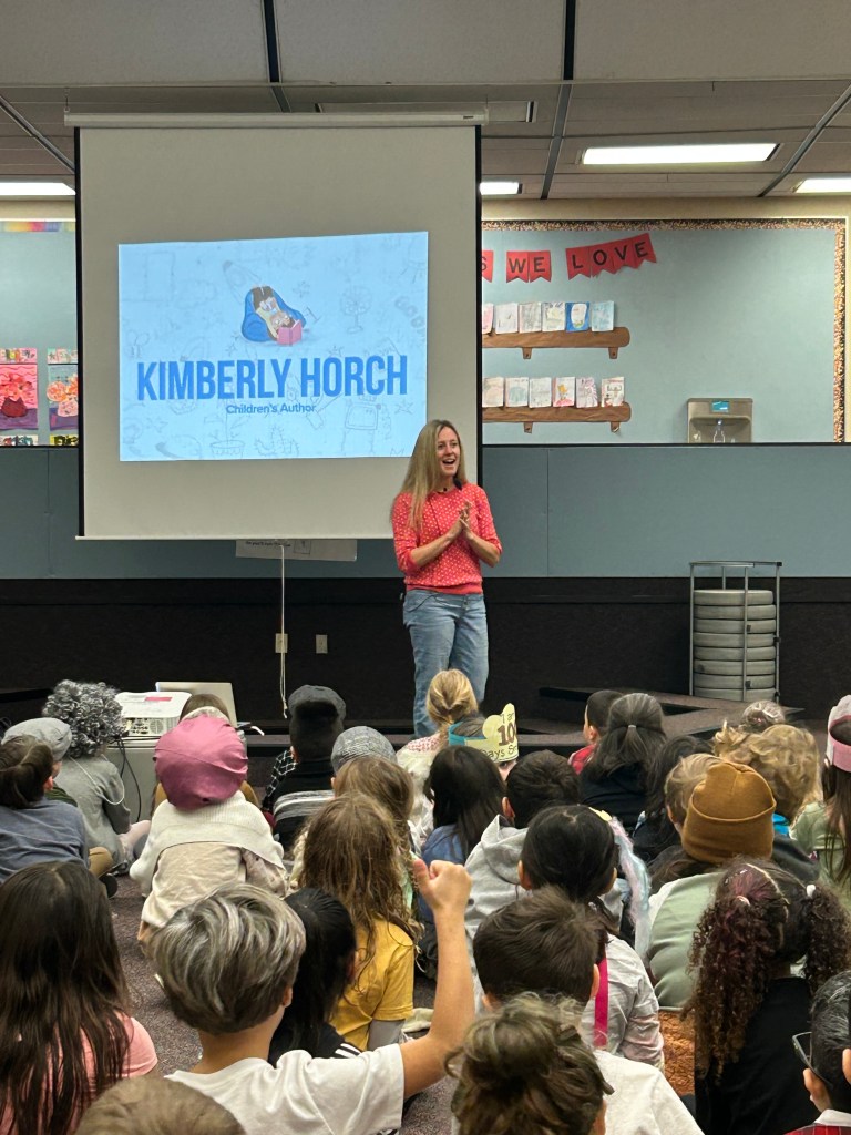 Kimberly speaking in front of students 